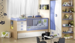 DORMITORIO INFANTIL COMPUESTA POR : CUNA CONVERTIBLE Y ARMARIO DE DOS PUERTAS CON CAJONES VISTOS Y TERMINAL.