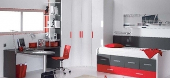 DORMITORIO JUVENIL CON CAMA COMPACTO O BICAMA CON CAJONES INTERMEDIOS Y CAMA ARRASTRE ; CON ARMARIO DE RINCÓN, LIBRERÍA Y MESA ESTUDIO EN ANGULO RECTO; EL DORMITORIO JUVENIL TIENE UN PREDOMINIO DEL BLANCO CON DETALLES PIZARRA Y ROJO.