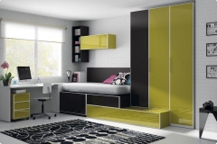 DORMITORIO JUVENIL CON COMPACTO ASIMÉTRICA, GRAN CAPACIDAD DE ARMARIOS Y MESA ESTUDIO. FRENTES EN BRILLO.