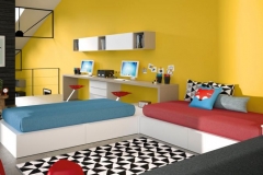 DORMITORIO JUVENIL CON DOS CAMAS NIDO CON CAJONES Y MESA ESTUDIO CON DOS PUESTOS DE TRABAJO.