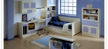 DORMITORIO DE PINO MACIZO,LACADO EN BLANCO Y LAVANDA; COMPUESTO POR CAMA NIDO, MESA ESTUDIO,LIBRERÍA CON CAJONES Y PUERTAS, ESTANTERÍAS Y ALTOS DE PUERTAS CON CAJONES.