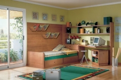 DORMITORIO JUVENIL EN MADERA DE PINO,CON CAMA NIDO, MESA ESTUDIO, LIBRERÍAS Y PANELES.